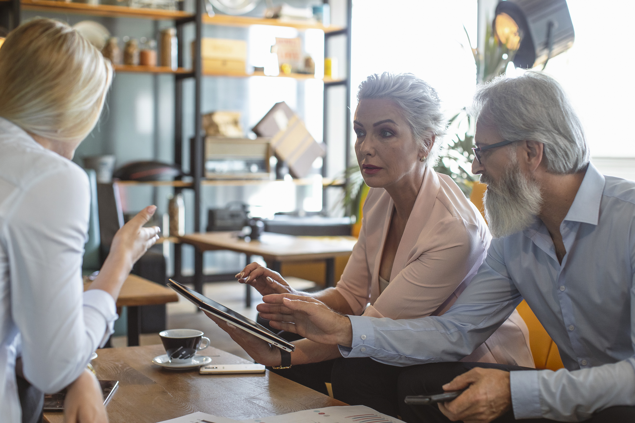 SMSF trustees discussing Division 296 with financial advisor