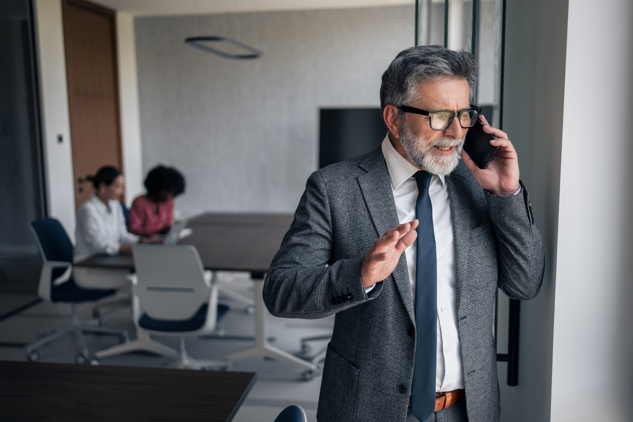 Worried company director on the phone